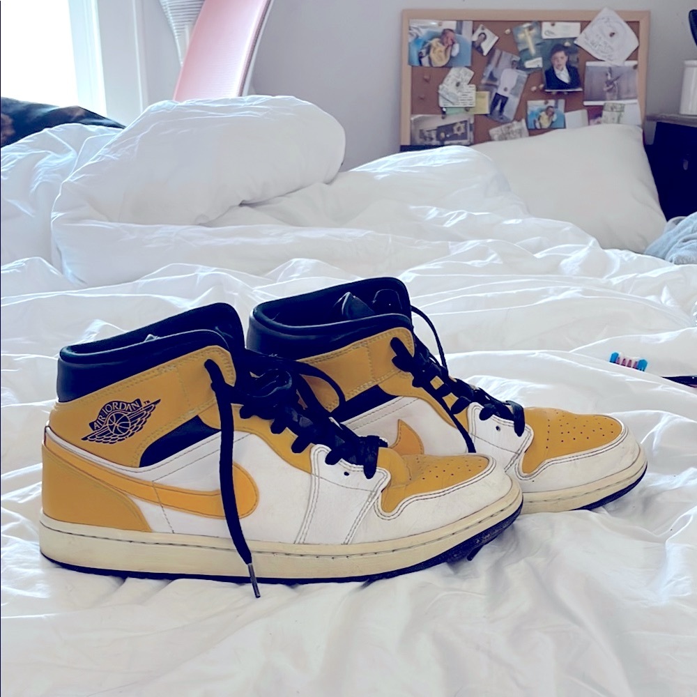 Yellow and White High-Top Sneakers Nike Air Jordan’s